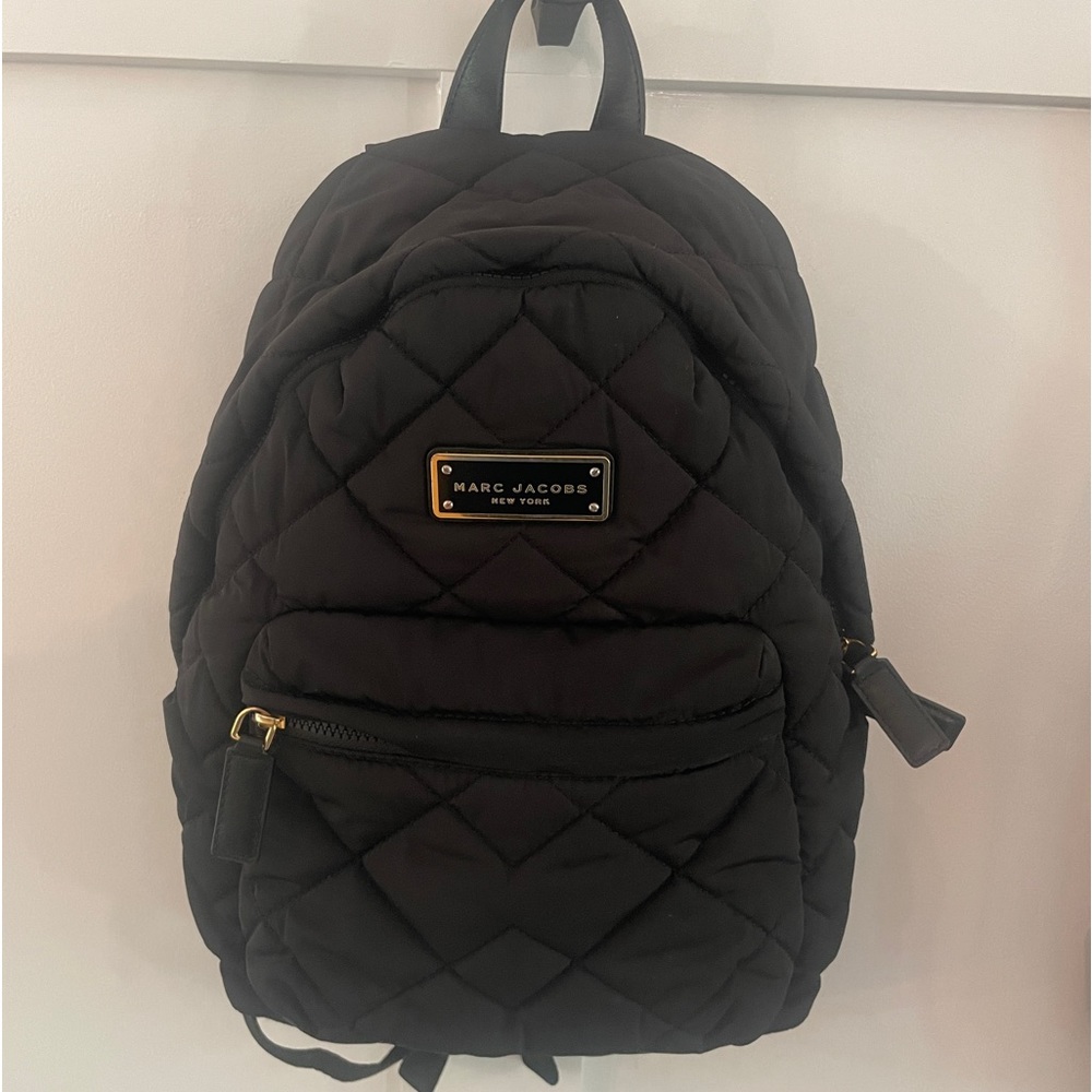 Marc Jacobs quilted bookbag.